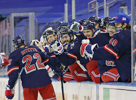 Feb 4, 2021; New York, NY, USA; The New York Rangers celebrate after a second period goal by defenseman Anthony Bitetto (22) against the Washington Capitals at Madison Square Garden. Mandatory Credit: Bruce Bennett/Pool Photo-USA TODAY Sports