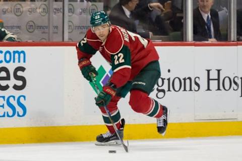 Feb 13, 2016; Saint Paul, MN, USA; Minnesota Wild forward Nino Niederreiter (22) skates with the puck in the second period against the Boston Bruins at Xcel Energy Center. Mandatory Credit: Brad Rempel-USA TODAY Sports