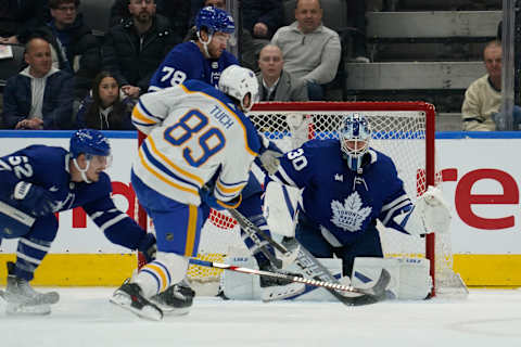 Mar 13, 2023; Toronto, Ontario, CAN; Buffalo Sabres forward Alex Tuch (89) scores the game winning goal against Toronto Maple Leafs goaltender Matt Murray (30) on this shot during the third period at Scotiabank Arena. Mandatory Credit: John E. Sokolowski-USA TODAY Sports