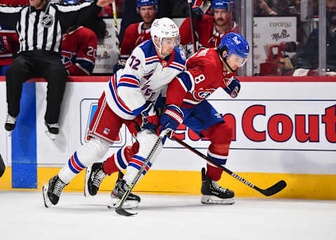 Filip Chytil and Ben Chiarot. (Photo by Minas Panagiotakis/Getty Images)