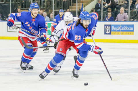 NEW YORK, NY – FEBRUARY 04: New York Rangers center Mika Zibanejad (93) skates with the puck as Los Angeles Kings center Michael Amadio (10) and New York Rangers center Vladislav Namestnikov (90) trail play during the Los Angeles Kings and New York Rangers NHL game on February 4, 2019, at Madison Square Garden in New York, NY. (Photo by John Crouch/Icon Sportswire via Getty Images)