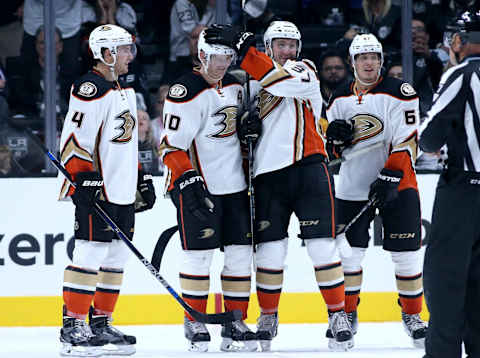 LOS ANGELES, CA – SEPTEMBER 29: Corey Perry #10 of the Anaheim Ducks celebrates his game-winning goal in overtime with Nick Richie #37, Cam Fowler #4, and Rickard Rakell #67 against the Los Angeles Kings for the game-winning goal in overtime during preseason at Staples Center on September 29, 2015, in Los Angeles, California. The Ducks won 2-1 in overtime. (Photo by Stephen Dunn/Getty Images)