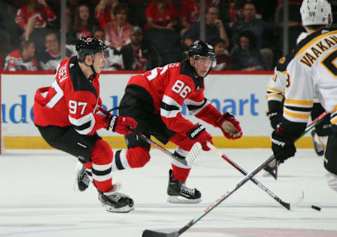 Nikita Gusev #97 and Jack Hughes #86 of the New Jersey Devils. (Photo by Bruce Bennett/Getty Images)