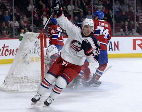 Jan 26, 2016; Montreal, Quebec, CAN; Columbus Blue Jackets forward Cam Atkinson (13) celebrates after scoring a goal against the Montreal Canadiens during the third period at the Bell Centre. Mandatory Credit: Eric Bolte-USA TODAY Sports