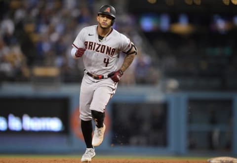 Sep 14, 2021; Los Angeles, California, USA; Arizona Diamondbacks second baseman Ketel Marte (4) rounds the bases after hitting a three run home run against the Los Angeles Dodgers in the seventh inning at Dodger Stadium. Mandatory Credit: Jayne Kamin-Oncea-USA TODAY Sports