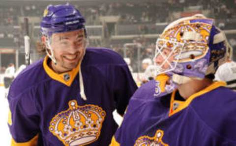 LOS ANGELES, CA – MARCH 19: Jonathan Bernier #45 and Drew Doughty #8 of the Los Angeles Kings talk on the ice in pre game warm ups wearing the Kings throw back jersey for the game against the Anaheim Ducks at Staples Center on March 19, 2011 in Los Angeles, California. (Photo by Juan Ocampo/NHLI via Getty Images)