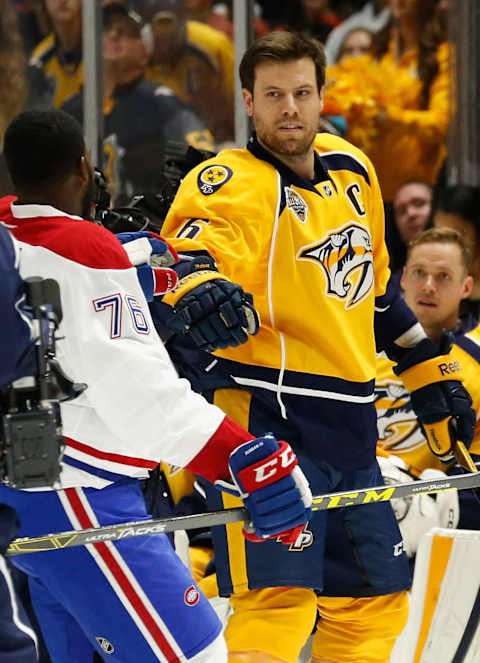 NASHVILLE, TN – JANUARY 30: Shea Weber #6 of the Nashville Predators fist bumps P.K. Subban (Photo by John Russell/NHLI via Getty Images)