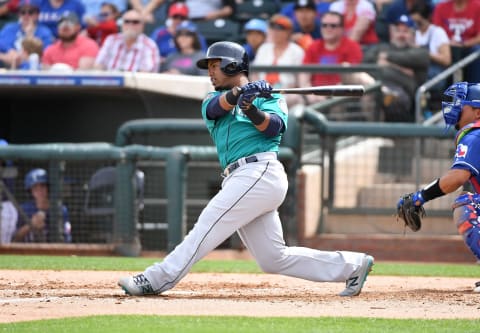 SURPRISE, AZ – MARCH 16: Jean Segura #2 of the Seattle Mariners follows through on a swing during a spring training game against the Texas Rangers at Surprise Stadium on March 16, 2018, in Surprise, Arizona. (Photo by Norm Hall/Getty Images)