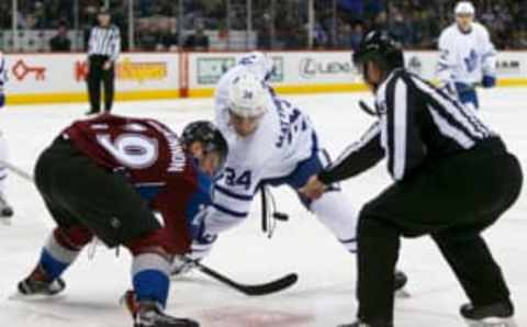 DENVER, CO – DECEMBER 22: Colorado Avalanche center, Nathan MacKinnon (29) and Toronto Maple Leafs center, Auston Matthews (34) face-off during a regular season NHL game between the Colorado Avalanche and the visiting Toronto Maple Leafs on December 22, 2016, at the Pepsi Center in Denver, CO. (Photo by Russell Lansford/Icon Sportswire via Getty Images)