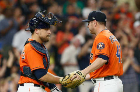 HOUSTON, TX – JULY 06: Brad Peacock #41 of the Houston Astros shakes hands with Tim Federowicz #19 after the final out against the Chicago White Sox at Minute Maid Park on July 6, 2018 in Houston, Texas. (Photo by Bob Levey/Getty Images)