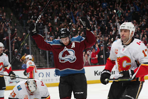 DENVER, COLORADO – DECEMBER 09: Nathan Mackinnon #29 of the Colorado Avalanche celebrates a goal against the Calgary Flames at Pepsi Center on December 09, 2019 in Denver, Colorado. The Flames defeated the Avalanche 5-4 in overtime. (Photo by Michael Martin/NHLI via Getty Images)