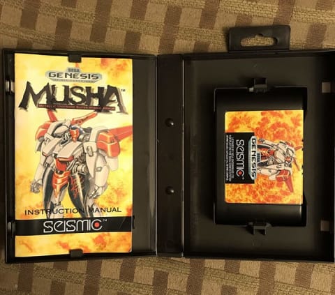 A copy of M.U.S.H.A. for Sega Genesis in its box