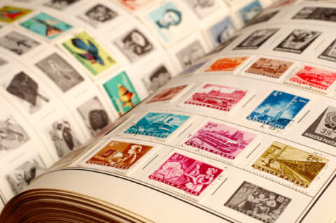 Postage stamps in a collector's book