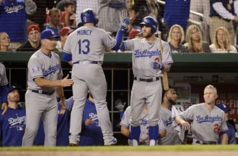 WASHINGTON, DC – MAY 19: Max Muncy #13 of the Los Angeles Dodgers celebrates with Chris Taylor #3 after hitting a home run in the fifth inning against the Washington Nationals at Nationals Park during game two of a doubleheader on May 19, 2018 in Washington, DC. (Photo by Greg Fiume/Getty Images)