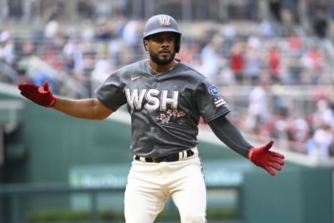 Jul 8, 2023; Washington, District of Columbia, USA; Washington Nationals designated hitter Jeimer Candelario (9) reacts after hitting a three run home run against the Texas Rangers during the first inning at Nationals Park. Mandatory Credit: Brad Mills-USA TODAY Sports