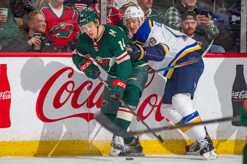 ST. PAUL, MN – FEBRUARY 27: Joel Eriksson Ek #14 of the Minnesota Wild skates with the puck while Jay Bouwmeester #19 of the St. Louis Blues defends during the game at the Xcel Energy Center on February 27, 2018 in St. Paul, Minnesota. (Photo by Bruce Kluckhohn/NHLI via Getty Images)