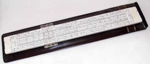 Image of a vintage log log slide rule.