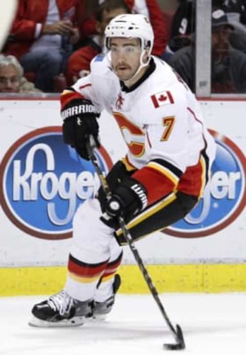 Nov 20, 2016; Detroit, MI, USA; Calgary Flames defenseman TJ Brodie (7) skates with the puck during the first period against the Detroit Red Wings at Joe Louis Arena. Mandatory Credit: Raj Mehta-USA TODAY Sports