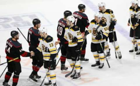 May 16, 2019; Raleigh, NC, USA; Carolina Hurricanes players congratulate Boston Bruins players in the handshake line after their game in game four of the Eastern Conference Final of the 2019 Stanley Cup Playoffs at PNC Arena. The Bruins won the game 4-0, and clinched the eastern conference championship 4-0. Mandatory Credit: Geoff Burke-USA TODAY Sports