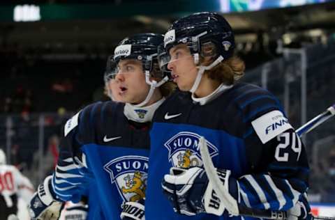 EDMONTON, AB – DECEMBER 26: Brad Lambert #33 and Ville Koivunen #24 of Finland celebrate a goal against Austria in the third period during the 2022 IIHF World Junior Championship at Rogers Place on December 27, 2021 in Edmonton, Canada. (Photo by Codie McLachlan/Getty Images)