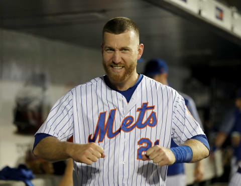 NEW YORK, NY – SEPTEMBER 26: Todd Frazier #21 of the New York Mets smiles as he walks into the clubhouse before the game against the Atlanta Braves on September 26, 2018 at Citi Field in the Flushing neighborhood of the Queens borough of New York City. (Photo by Elsa/Getty Images)