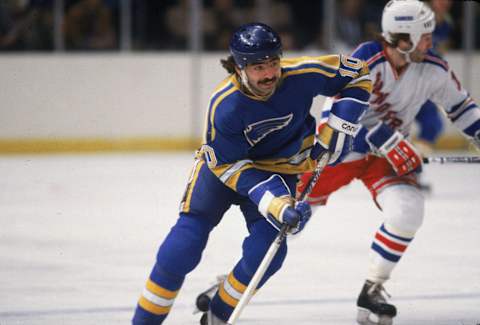 Canadian professional hockey player Wayne Babych forward of the St. Louis Blues skates up the ice as Don Maloney forward of the New York Rangers pursues, Madison Square garden, New York, March 1982. (Photo by Bruce Bennett Studios via Getty Images/Getty Images)