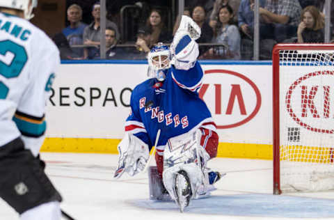 NEW YORK, NY – OCTOBER 11: Henrik Lundqvist (30) of the New York Rangers makes a stunning glove save during a game between the New York Rangers and the San Jose Sharks on October 11, 2018 at Madison Square Garden in New York, New York. (Photo by John McCreary/Icon Sportswire via Getty Images)