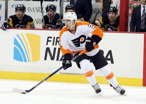 Jan 21, 2016; Pittsburgh, PA, USA; Philadelphia Flyers right wing Matt Read (24) skates with the puck against the Pittsburgh Penguins during the second period at the CONSOL Energy Center. Mandatory Credit: Charles LeClaire-USA TODAY Sports