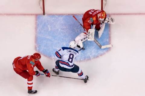 VANCOUVER, BC – JANUARY 4: Sasha Chmelevski #8 of the United States shoot the puck past goalie Pyotr Kochetkov #20 of Russia for a goal after slipping the check of Alexander Alexeyev #4 of Russia in Semifinals hockey action of the 2019 IIHF World Junior Championship on January, 4, 2019 at Rogers Arena in Vancouver, British Columbia, Canada. (Photo by Rich Lam/Getty Images)