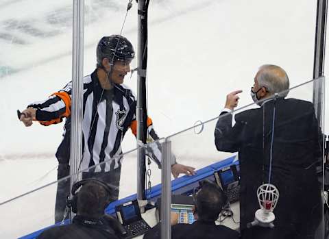 Referee Wes McCauley works the Toronto Maple Leafs game (Photo by Andre Ringuette/Freestyle Photo/Getty Images)