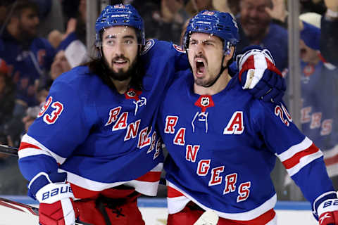 Mar 2, 2022; New York, New York, USA; New York Rangers left wing Chris Kreider (20) celebrates his goal against the St. Louis Blues with center Mika Zibanejad (93) during the third period at Madison Square Garden. The Rangers defeated the Blues 5-3. Mandatory Credit: Brad Penner-USA TODAY Sports