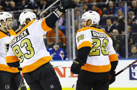 NHL Power Rankings: Philadelphia Flyers right wing Jakub Voracek (93) celebrates with center Claude Giroux (28) after scoring a goal against the New York Rangers during the third period at Madison Square Garden. The Flyers won 2-0. Mandatory Credit: Andy Marlin-USA TODAY Sports