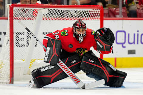 Nov 16, 2023; Chicago, Illinois, USA; Chicago Blackhawks goaltender Petr Mrazek (34) defends the net against the Tampa Bay Lightning at United Center. Mandatory Credit: Jamie Sabau-USA TODAY Sports