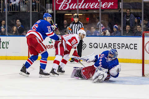 NEW YORK, NY – NOVEMBER 24: New York Rangers Goalie Henrik Lundqvist (30) reaches out to glove the puck during the third period of a regular season NHL game between the Detroit Red Wings and the New York Rangers on November 24, 2017, at Madison Square Garden in New York, NY. (Photo by David Hahn/Icon Sportswire via Getty Images)