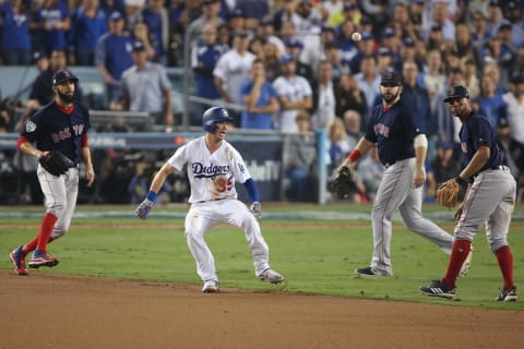 LOS ANGELES, CA – OCTOBER 26: Cody Belllinger #35 of the Los Angeles Dodgers attempts to steal second base and gets caught in a run down during the ninth inning of Game 3 of the 2018 World Series against the Boston Red Sox at Dodger Stadium on Friday, October 26, 2018 in Los Angeles, California. (Photo by Rob Leiter/MLB Photos via Getty Images)