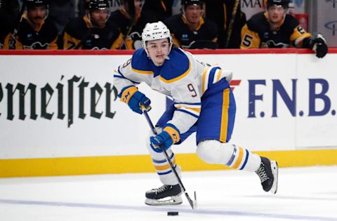 Sep 28, 2023; Pittsburgh, Pennsylvania, USA; Buffalo Sabres forward Zach Benson (9) skates with the puck against the Pittsburgh Penguins during the first period at PPG Paints Arena. Mandatory Credit: Charles LeClaire-USA TODAY Sports