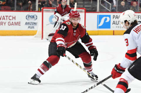 GLENDALE, AZ – JANUARY 04: Alex Goligoski #33 of the Arizona Coyotes skates back into his own zone while defending the puck against the New Jersey Devils at Gila River Arena on January 4, 2019 in Glendale, Arizona. (Photo by Norm Hall/NHLI via Getty Images)