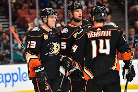 ANAHEIM, CA – SEPTEMBER 26: right wing Jakob Silfverberg (33) celebrates his goal with center Ryan Getzlaf (15) and centerAdam Henrique (14) during a NHL preseason game between the Los Angeles Kings and the Anaheim Ducks played on September 26, 2018 at the Honda Center in Anaheim, CA.