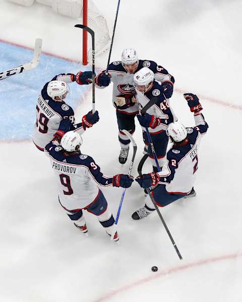 SUNRISE, FL – NOVEMBER 6: Teammates congratulate Alexandre Texier #42 of the Columbus Blue Jackets after he scored a third period goal against the Florida Panthers at the Amerant Bank Arena on November 6, 2023 in Sunrise, Florida. (Photo by Joel Auerbach/Getty Images)