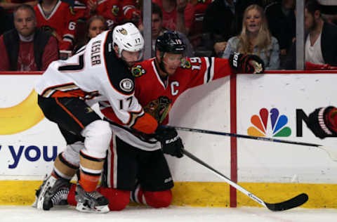 CHICAGO, IL: Ryan Kesler #17 of the Anaheim Ducks checks Jonathan Toews #19 of the Chicago Blackhawks in the second period of Game Four of the 2015 Western Conference Finals on May 23, 2015. (Photo by Jonathan Daniel/Getty Images)