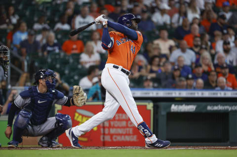 Jul 21, 2022; Houston, Texas, USA; Houston Astros designated hitter Yordan Alvarez (44) hits a home run during the first inning against the New York Yankees at Minute Maid Park. Mandatory Credit: Troy Taormina-USA TODAY Sports