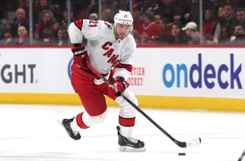 Feb 29, 2020; Montreal, Quebec, CAN; Carolina Hurricanes right wing Nino Niederreiter (21) skates with the puck against Montreal Canadiens during the third period at Bell Centre. Mandatory Credit: Jean-Yves Ahern-USA TODAY Sports