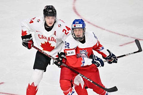 HALIFAX, CANADA – JANUARY 05: Ethan del Mastro #24 of Team Canada and Eduard Sale #28 of Team Czech Republic skate against each other during the third period in the gold medal round of the 2023 IIHF World Junior Championship at Scotiabank Centre on January 5, 2023 in Halifax, Nova Scotia, Canada. (Photo by Minas Panagiotakis/Getty Images)