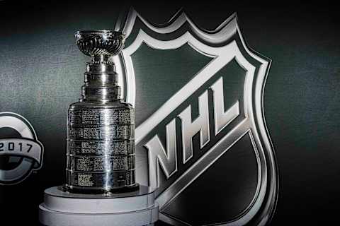 Jan 14, 2017; Dallas, TX, USA; A general view of the Stanley Cup and NHL Logo before the game between the Dallas Stars and the Minnesota Wild at American Airlines Center. Mandatory Credit: Jerome Miron-USA TODAY Sports