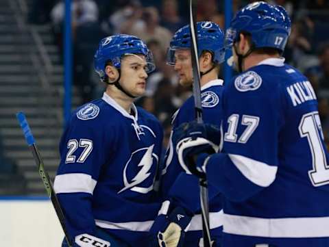 Dec 10, 2015; Tampa, FL, USA; Tampa Bay Lightning left wing Jonathan Drouin (27), defenseman Anton Stralman (6) and center Alex Killorn (17) talk against the Ottawa Senators during the third period at Amalie Arena. Tampa Bay Lightning defeated the Ottawa Senators 4-1. Mandatory Credit: Kim Klement-USA TODAY Sports