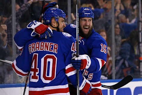 May 4, 2017; New York, NY, USA; New York Rangers left wing Tanner Glass (15) and New York Rangers right wing Michael Grabner (40) celebrate a goal scored by New York Rangers center Oscar Lindberg against the Ottawa Senators during the second period in game four of the second round of the 2017 Stanley Cup Playoffs at Madison Square Garden. Mandatory Credit: Adam Hunger-USA TODAY Sports