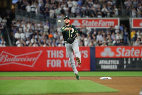 NEW YORK, NY – OCTOBER 3: Jed Lowrie #8 of the Oakland Athletics throws the ball to first base during the American League Wild Card game against the New York Yankees at Yankee Stadium on Wednesday, October 3, 2018 in the Bronx borough of New York City. (Photo by Alex Trautwig/MLB Photos via Getty Images)