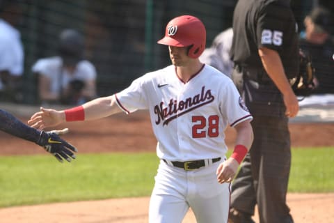 WASHINGTON, DC – SEPTEMBER 15: Lane Thomas #28 of the Washington Nationals celebrates scoring a run during a baseball game against the Miami Marlins at Nationals Park on September 15, 2021 in Washington, DC. (Photo by Mitchell Layton/Getty Images)