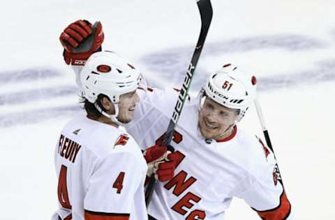 TORONTO, ONTARIO – AUGUST 12: Jake Gardiner #51 congratulates Haydn Fleury #4 on his goal at 9:49 of the third period against the Boston Bruins in Game One of the Eastern Conference First Round during the 2020 NHL Stanley Cup Playoffs at Scotiabank Arena on August 12, 2020, in Toronto, Ontario, Canada. (Photo by Elsa/Getty Images)