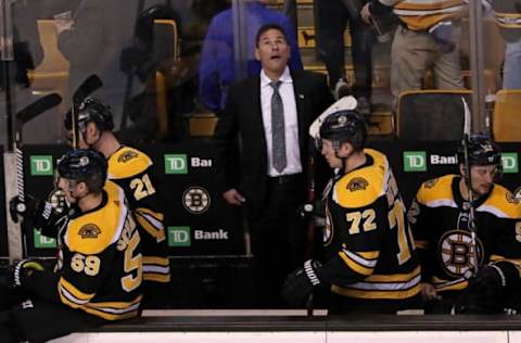 BOSTON – NOVEMBER 11: Boston Bruins head coach Bruce Cassidy watches the replay after an empty net goal late in the third period sealed the Bruins’ 4-1 loss. The Boston Bruins host the Toronto Maple Leafs in a regular season NHL hockey game at TD Garden in Boston on Nov. 11, 2017. (Photo by Barry Chin/The Boston Globe via Getty Images)